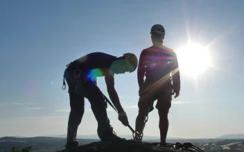 Free Stock Video Two Mountaineers On A Peak Under The Blazing Sun