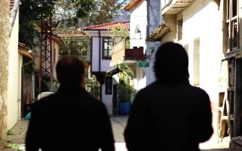 Free Stock Video Two Men Walking Along The Old Alleys