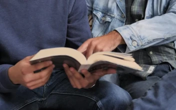 Free Stock Video Two Men Reading A Book Together