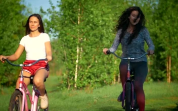 Free Stock Video Two Girls Riding Bikes In Nature