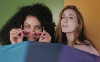 Free Stock Video Two Girls Having Fun With A Colorful Umbrella