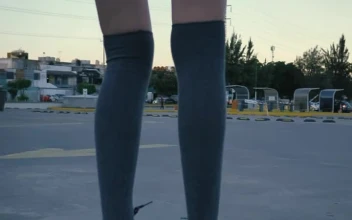Free Stock Video Young Woman Skating Slowly In A Parking Lot