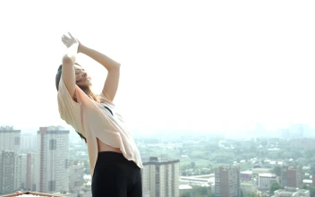 Free Stock Video Young Woman Practicing Yoga Poses On A Rooftop