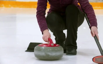 Free Stock Video Young Woman Playing Curling On An Ice Rink
