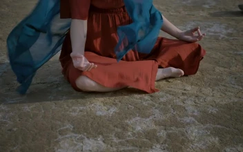 Free Stock Video Young Woman Meditating Sitting On The Ground