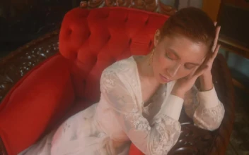 Free Stock Video Young Woman From An Old Era Sitting On A Sofa