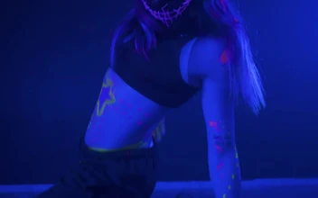 Free Stock Video Young Woman Dancing With A Mask Under A Party Light