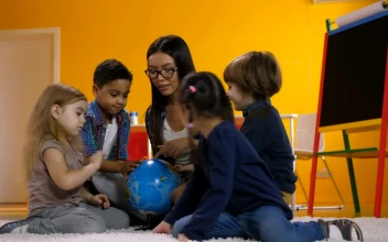 Free Stock Video Young Teacher Teaching Geography To A Few Children