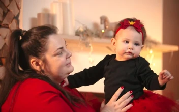 Free Stock Video Young Mother Holding Her Baby And Playing With Her