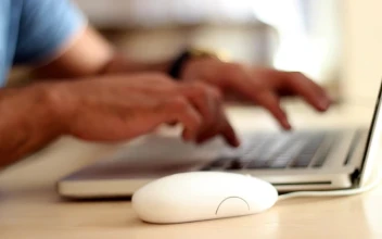 Free Stock Video Young Man Working On A Laptop With Mouse