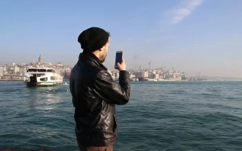 Free Stock Video Young Man Taking Photos On A Sunny Shore