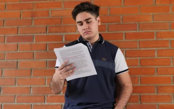 Free Stock Video Young Man Studying In The Corridors Of His School