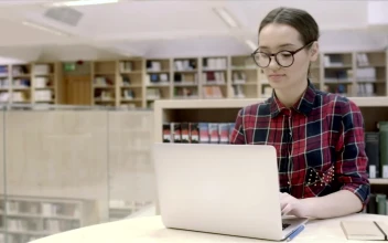 Free Stock Video Young Female Student Portrait In The Library