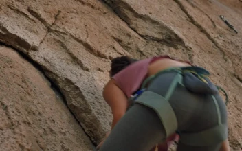 Free Stock Video Young Female Mountaineer Climbing A Rocky Mountain