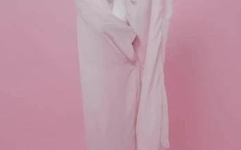 Free Stock Video Young Female Model Posing On A Pink Background