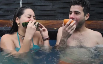 Free Stock Video Young Couple Eating Fruit In The Swimming Pool