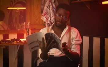 Free Stock Video Young Barber Hanging Out Sitting In His Barbershop