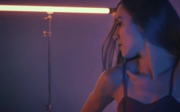 Free Stock Video Young Ballerina Dancing Artistically In A Dark Place