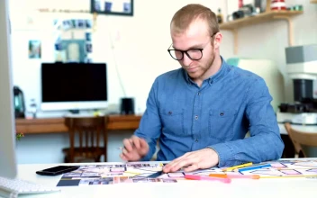 Free Stock Video Young Architect Works Concentrated On A Blueprint
