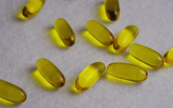 Free Stock Video Yellow Colored Pills Over A Wide Fabric