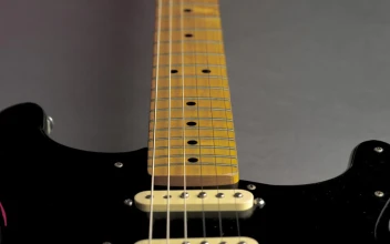 Free Stock Video Wooden Neck Of A Black Electric Guitar