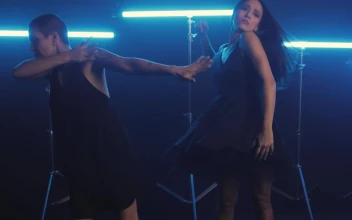 Free Stock Video Women Dancing Energetically With Neon Blue Lights