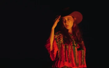 Free Stock Video Woman With Mexican Style Under The Light Of A Bonfire