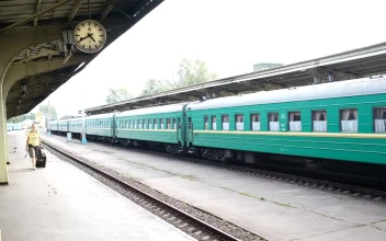 Free Stock Video Woman With Luggage At A Train Station
