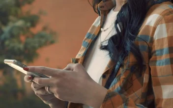 Free Stock Video Woman With A Face Mask Texting On The Phone