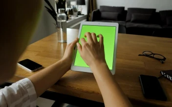 Free Stock Video Woman Using A Tablet With A Green Screen