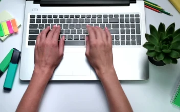 Free Stock Video Woman Typing On An English Keyboard