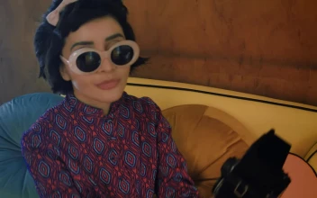 Free Stock Video Woman Taking A Selfie With An Old Camera