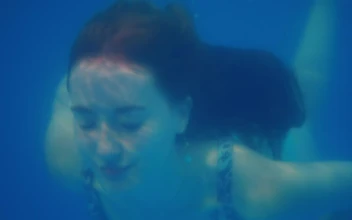 Free Stock Video Woman Swimming Underwater