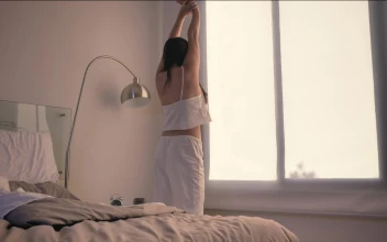 Free Stock Video Woman Stretching In The Morning Before Starting Her Day