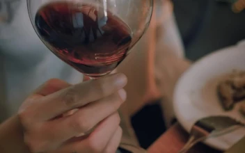 Free Stock Video Woman Shaking A Glass Of Wine Before Drinking From It