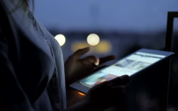 Free Stock Video Woman Scrolling The Web On A Tablet