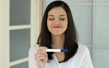 Free Stock Video Woman Rejoices After Seeing Her Pregnancy Test