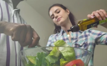 Free Stock Video Woman Pouring Olive Oil Over Salad