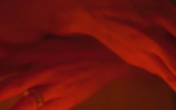 Free Stock Video Woman Passing Her Hands Near The Flame Of A Candle