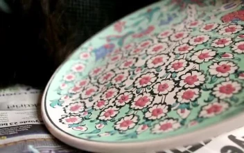 Free Stock Video Woman Painting Flowers Hand On A Large Plate Small