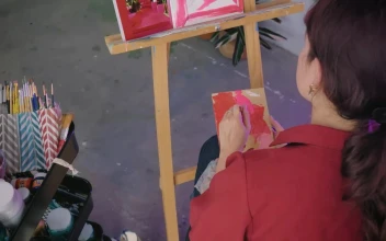 Free Stock Video Woman Painting A Picture From A Photograph