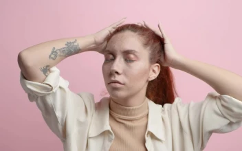 Free Stock Video Woman On A Pink Background Slowly Moving Her Hair