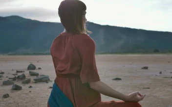 Free Stock Video Woman Meditating Sitting In A Desert