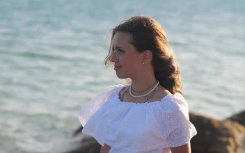 Free Stock Video Woman Looking Out To Sea On The Beach