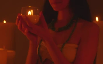 Free Stock Video Woman Laughing Out Loud Looking At A Burning Candle