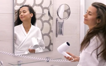 Free Stock Video Woman In Robe Singing Happily In Front Of The Mirror