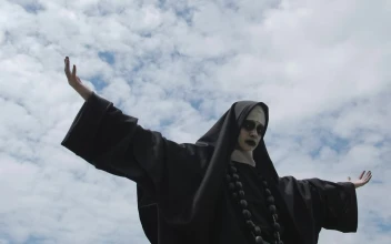 Free Stock Video Woman In Nun Costume On A Cloudy Day
