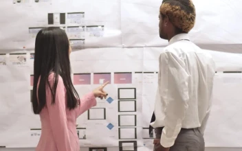 Free Stock Video Woman In A Suit Approves The Work Of Her Office
