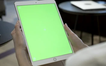 Free Stock Video Woman Holding A Tablet With A Chroma Key Screen