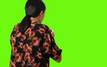 Free Stock Video Woman From Behind Taking A Photo On A Green Background